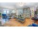 Inviting living room with hardwood floors, comfortable seating, and decorative shelving at 270 Polk Rd, Covington, GA 30014