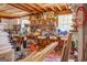 Spacious workshop with exposed beam ceilings, built-in shelving, and abundant natural light at 270 Polk Rd, Covington, GA 30014