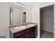 Bathroom featuring double sinks, granite counters, and walk-in closet access at 11755 Lovejoy Crossing Blvd, Hampton, GA 30228