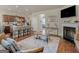 Open living space combines kitchen and living room areas, featuring a modern coffee table at 11755 Lovejoy Crossing Blvd, Hampton, GA 30228