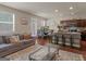 Open-concept living space with a view of the kitchen and dining area; ideal for entertaining at 11755 Lovejoy Crossing Blvd, Hampton, GA 30228