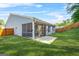 Beautiful backyard with a screened porch and well-maintained lawn at 790 Riverwood Pass, Dallas, GA 30157