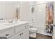 Well-maintained bathroom with modern vanity, complemented by a shower and tub combination featuring a stylish curtain at 790 Riverwood Pass, Dallas, GA 30157