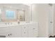 Bright bathroom with double sink vanity and large mirror and a shower stall at 790 Riverwood Pass, Dallas, GA 30157