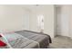 Comfortable bedroom with a bathroom, featuring plush carpeting, and neutral tones creating a relaxing atmosphere at 790 Riverwood Pass, Dallas, GA 30157