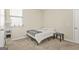 Bedroom features a twin bed, and small side table at 790 Riverwood Pass, Dallas, GA 30157
