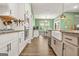 Spacious kitchen with an island, stainless appliances, and hardwood flooring throughout at 790 Riverwood Pass, Dallas, GA 30157
