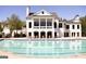Stunning view of the pool, cabana, and lounge chairs, perfect for relaxation and recreation with community clubhouse at 790 Riverwood Pass, Dallas, GA 30157