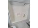 A clean and functional bathroom showcasing a white tub and shower combo, designed for relaxation at 222 Flat Creek Ct, Peachtree City, GA 30269