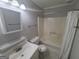 Clean bathroom with a single sink and a shower-tub combo at 222 Flat Creek Ct, Peachtree City, GA 30269