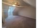 A room with a ceiling fan, window, and carpet to create a cozy and comfortable living space at 222 Flat Creek Ct, Peachtree City, GA 30269