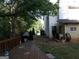 Backyard with wooden deck, grill, shed, and well-maintained lawn, ideal for outdoor activities and gatherings at 1253 Heartwood Ave, Mcdonough, GA 30253