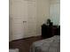 Bedroom features a closet, and desk with natural light from a window at 1253 Heartwood Ave, Mcdonough, GA 30253