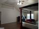 Bedroom featuring hardwood floors, natural light, and plenty of space, perfect for relaxation and comfort at 1253 Heartwood Ave, Mcdonough, GA 30253