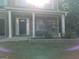 Exterior view of the front porch of a two story brick home at 1253 Heartwood Ave, Mcdonough, GA 30253