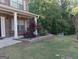 Well maintained lawn and landscaping adorn the front yard of this brick home at 1253 Heartwood Ave, Mcdonough, GA 30253