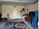 Spacious garage with ample storage and a work area at 1253 Heartwood Ave, Mcdonough, GA 30253