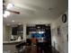 Open kitchen with granite countertops, breakfast bar, and stainless appliances at 1253 Heartwood Ave, Mcdonough, GA 30253