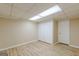 Basement room with laminate flooring and closet at 13819 Woolsey Rd, Hampton, GA 30228