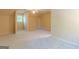 Spacious bedroom with neutral carpet, and natural light from the window at 13819 Woolsey Rd, Hampton, GA 30228