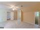 Bright and airy bedroom with soft carpet, a ceiling fan, and access to a closet and a bathroom at 13819 Woolsey Rd, Hampton, GA 30228