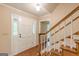 Inviting entryway featuring tile flooring, staircase, and paneled front door with sidelights at 13819 Woolsey Rd, Hampton, GA 30228