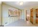 An eat-in kitchen is adjacent to another room and has tile floors and a built-in counter space at 13819 Woolsey Rd, Hampton, GA 30228