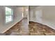 Inviting entrance hallway with durable flooring, neutral walls, and high ceilings that brings a sense of spaciousness at 1162 Ida Woods Ln # 23, Lawrenceville, GA 30045