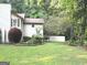 Spacious backyard with a privacy fence, perfect for outdoor activities and relaxation at 15 Perthshire Dr, Peachtree City, GA 30269