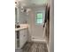 Bright bathroom featuring a glass door shower, stylish vanity, and heated towel rack at 15 Perthshire Dr, Peachtree City, GA 30269