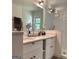 Bathroom with double sinks, granite countertops, and a glass-enclosed shower at 15 Perthshire Dr, Peachtree City, GA 30269