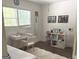 Bright bedroom featuring a desk, a book shelf, and a fur rug at 15 Perthshire Dr, Peachtree City, GA 30269