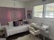 Bright bedroom featuring a white desk, a mandala tapestry, and a fur rug at 15 Perthshire Dr, Peachtree City, GA 30269