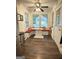 Inviting breakfast nook with banquette seating and view to fenced backyard at 15 Perthshire Dr, Peachtree City, GA 30269