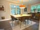 Charming dining room with a stylish table, modern chairs, and natural light at 15 Perthshire Dr, Peachtree City, GA 30269