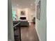 Hallway featuring wood floors, recessed lighting, and a view into the living room at 15 Perthshire Dr, Peachtree City, GA 30269