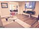 Open-concept living space with a television, dining area view and comfortable seating at 15 Perthshire Dr, Peachtree City, GA 30269