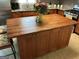 Kitchen featuring a central island, stainless appliances, and light countertops at 3999 Cumberland Se Trl, Conyers, GA 30094