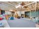 Unfinished basement with exposed ceiling and ample storage space at 1275 Mill Shyre Way, Lawrenceville, GA 30043