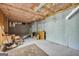 Unfinished basement with exposed ceiling and plenty of storage space at 1275 Mill Shyre Way, Lawrenceville, GA 30043
