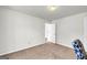 Spare bedroom featuring neutral walls and an open closet at 1275 Mill Shyre Way, Lawrenceville, GA 30043