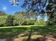 Spacious backyard with mature trees, creating a private and serene setting, perfect for outdoor enjoyment at 140 Julie Rd, Tyrone, GA 30290