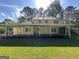 Expansive backyard featuring a large deck, perfect for outdoor entertaining at 140 Julie Rd, Tyrone, GA 30290