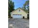 A detached two-car garage with a gable roof, offering ample parking and storage space at 140 Julie Rd, Tyrone, GA 30290