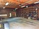 Inside the detached garage, showing ample storage space with shelving units at 140 Julie Rd, Tyrone, GA 30290