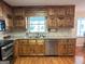 Eat-in kitchen featuring stainless steel appliances, tiled backsplash, and granite countertops at 140 Julie Rd, Tyrone, GA 30290