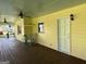 Enjoy a wide covered porch with ceiling fans and serene views, providing a comfortable outdoor living experience at 140 Julie Rd, Tyrone, GA 30290