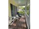 Relaxing porch area with comfortable seating, a spot for enjoying the outdoors at 140 Julie Rd, Tyrone, GA 30290
