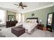 Bright bedroom with large windows, ceiling fan and neutral color scheme for a cozy feel at 207 Jamestown Ave, Jonesboro, GA 30236