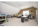 Spacious bonus room filled with natural light and offering versatile usage options at 207 Jamestown Ave, Jonesboro, GA 30236